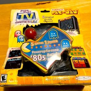 1980’s style PAC Man Game and controller. New in Box.
